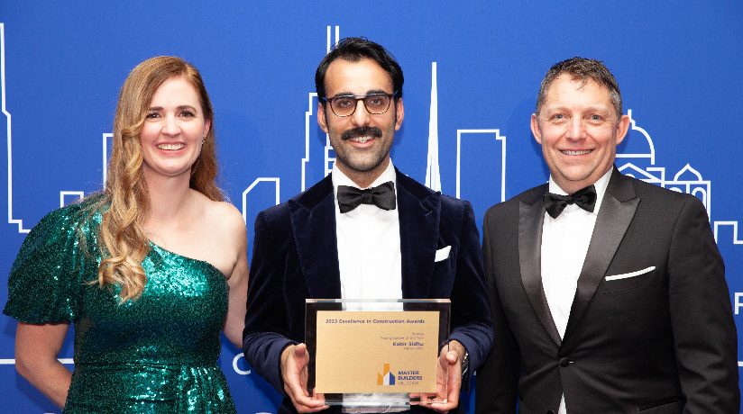 Master Builders Victoria CEO Michaela Lihou and President Geoff Purcell Present Young Builder of the Year Kabir Sidhu with his Award.